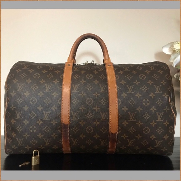 Louis Vuitton Handbags - Authentic Louis Vuitton Keepall 50 (with lock/key)